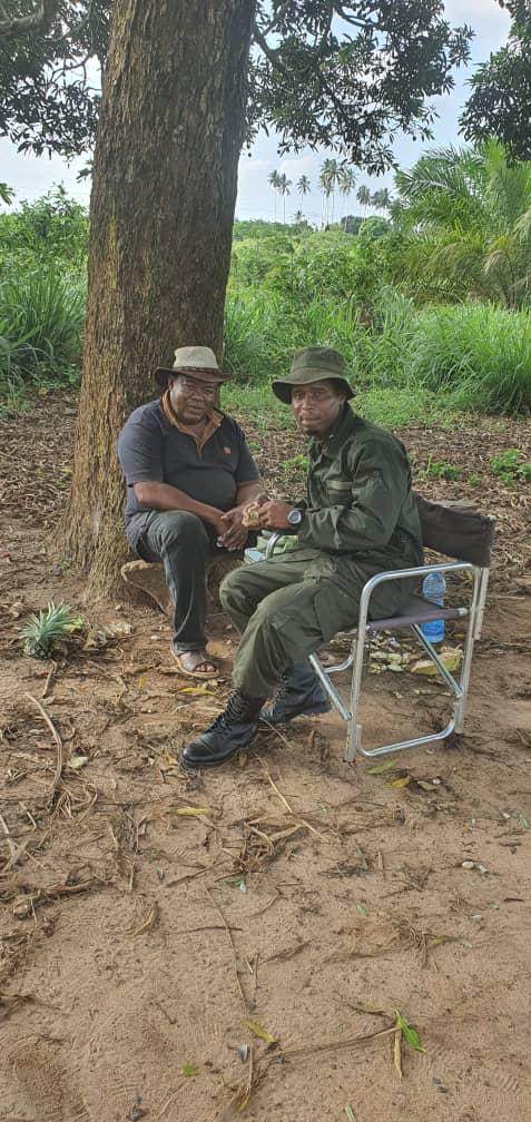 Chairman with John Game officer exchanging idea.